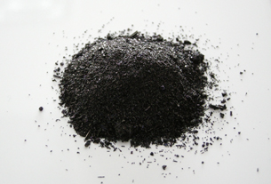 A photograph shows a small pile of permanganate, which looks like black powder or dirt.