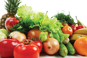 A photograph shows many ripe fruits and vegetables. 