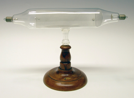A photograph shows a cathode ray inside a cathode ray tube.