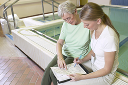 This is a photo of a patient and a physical therapist.