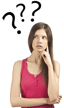 This is a photo of a young womanlooking to the side in thought. There are question marks above her head.