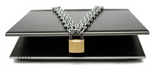 Laptop with chain and padlock on it.
