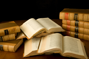 A photograph shows a pile of books.