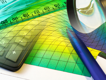 This is a collage of tools use in analysis, such as a calculator, a ruler, a pen, and graph paper.