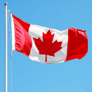 This is an image of a Canadian flag fluttering in the wind.