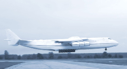 This photograph shows an Antonov cargo plane taking off.