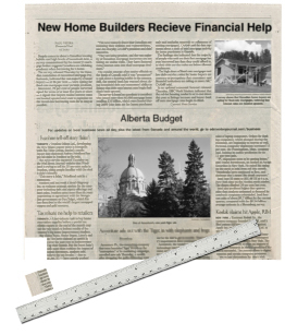 This shows the square-foot piece of newspaper with one square inch removed from the corner.