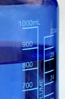 This is a photograph of a beaker showing capacity in millilitres and fluid ounces.