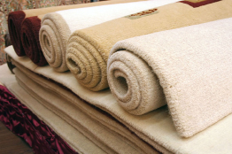 This photograph shows rolls of carpet.