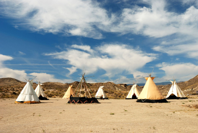 This photograph shows teepees in a First Nation’s village.