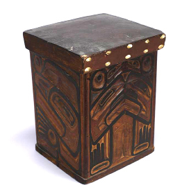 The photograph shows a bentwood chest, which is representative of the artistry and woodworking skills of the First Nations of the Canadian West Coast.