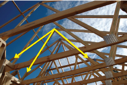 A photo of a framed roof shows rays overlaid on rafters to highlight adjacent angles.