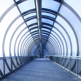 This photo is of a perspective drawing of a tunnel in blue tones.