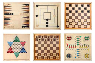 This is a photo of board games including backgammon, checkers, and chess.