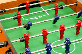 A photo shows a foosball table.