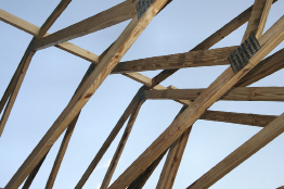 This photograph shows W-trusses in the construction of a building.