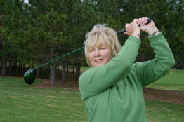 This is a photograph of Sandra Post, a renowned Canadian golfer.