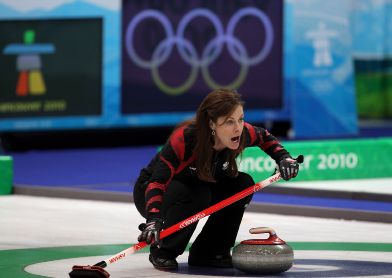 In this photo, skip Cheryl Bernard yells for her sweepers to sweep a rock.