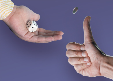 This image shows a hand flipping a coin and another hand rolling a die.