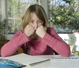 This is a picture of a frustrated student doing homework.