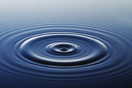 This is a photo of water ripples formed as circles coming from a central point.
