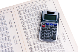 This is a photo of a logarithm table and a calculator.